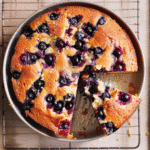 Rustic lemon blueberry olive oil cake—gluten-free, golden, and bursting with fresh berries.