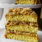 Slice of white german chocolate cake with cheesecake center